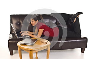 Business Woman with laptop on couch