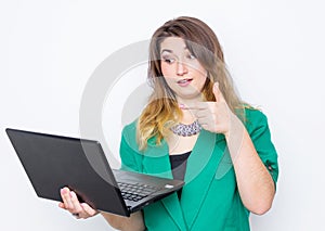 Business woman with laptop. Female model with long hair . Woman talks on Skype