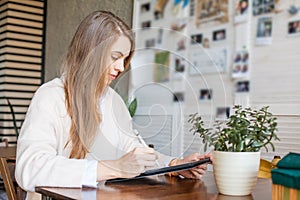 Business woman with laptop gadget working in open office place