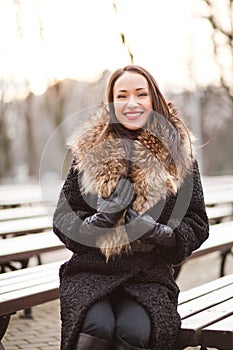 Business woman laughing in the park
