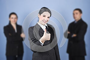 Business woman leader giving thumbs up