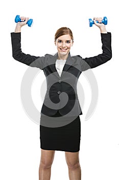 Business woman lifting weights
