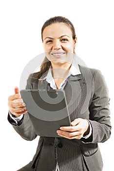 Business woman looking at the camera with tablet in hands tablet smiling