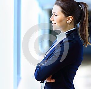 Business woman looking confident and smiling