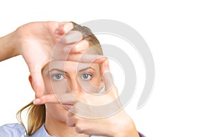 Business woman looking threw fingers