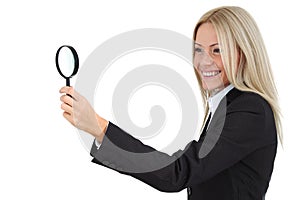 Business woman with magnifier