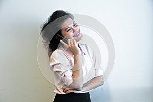 Business woman make a call on white background