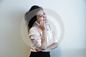 Business woman make a call on white background