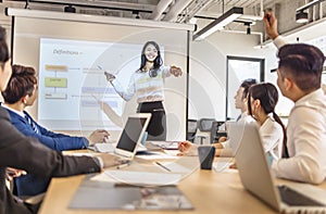 Business woman making  presentation in conference room