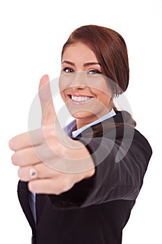 Business woman making thumb up ok gesture