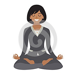 Business woman meditating. Concept of calm business, work at office. African-american business Woman in yoga pose