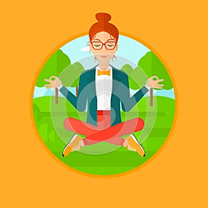 Business woman meditating in lotus position.
