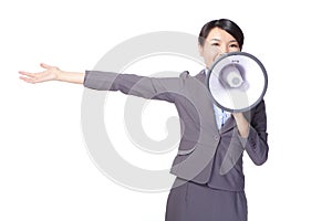 Business woman with megaphone yelling and showing