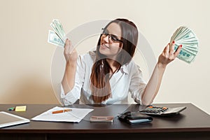 Business woman with money fans in hands