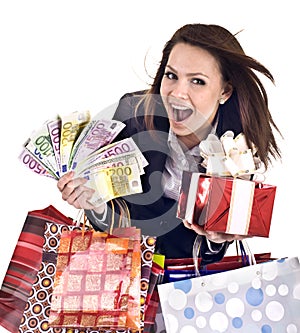 Business woman with money, gift box andbag.
