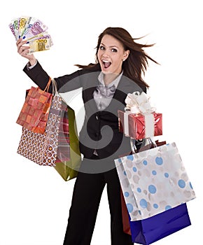 Business woman with money, gift box and bag.