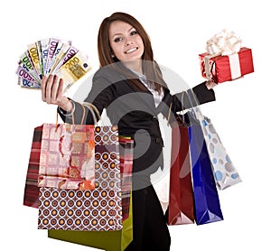 Business woman with money, gift box and bag.