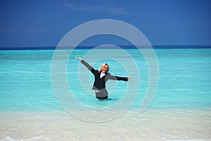 Business woman in ocean