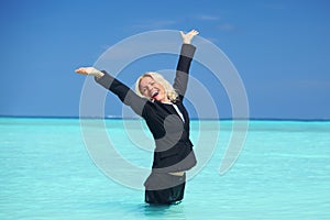 Business woman in ocean