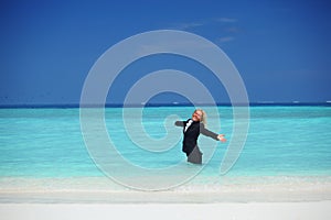 Business woman in ocean