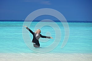 Business woman in ocean