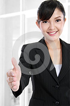 Business woman offering handshake