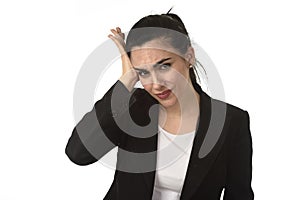 Business woman in office suit suffering migraine pain and strong headache with fingers on her tempo