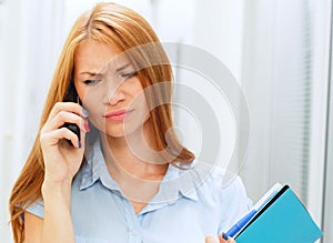 Business woman in office on work place in stress situation