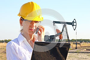 Business woman in an oilfield