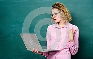 Business woman. online education. business school. happy student in glasses with laptop. modern technology. girl in