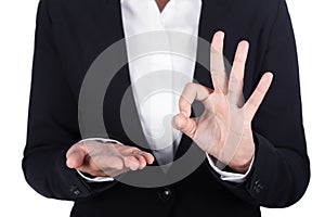 Business woman open hand holding something and showing OK sign