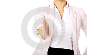 Business woman with an open hand ready for handshake