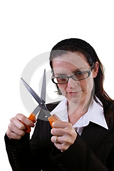 Business woman with open scissors