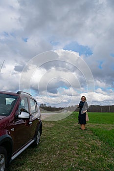 Business woman operate remote key car for open lock door