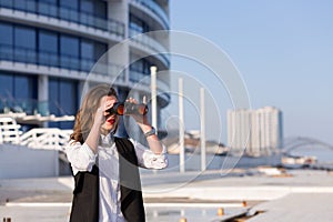 Business woman with a pair of binoculars