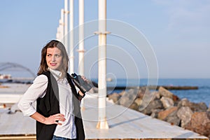 Business woman with a pair of binoculars