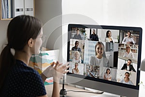 Business woman participate in group video call meeting with colleagues