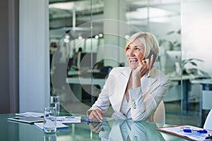 Business woman, phone call and talk in boardroom with networking and smile in an office. Mobile, professional and