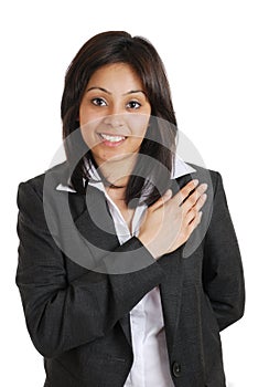 Business woman pledging with hand on chest