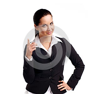 Business woman pointing at copyspace