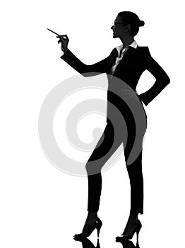 Business woman pointing showing silhouette