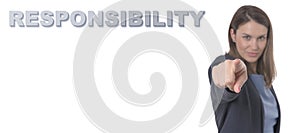 Business Woman pointing the text RESPONSIBILITY CONCEPT