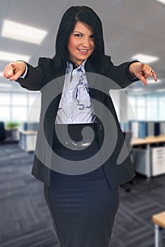 Business woman pointing to you