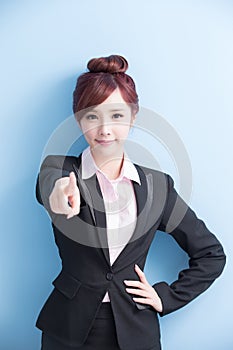 Business woman pointing to you