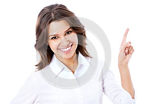 Business woman pointing at white background