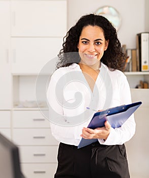 Business woman politely welcoming to office