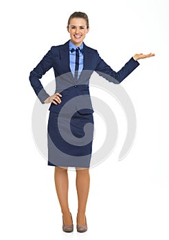 Business woman presenting something on empty palm