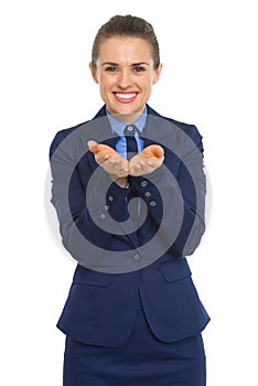 Business woman presenting something on empty palm