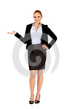 Business woman presenting something on open palm
