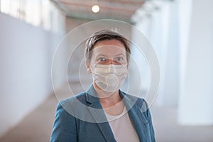 Business woman with protective face mask during Covid 19 pandemics